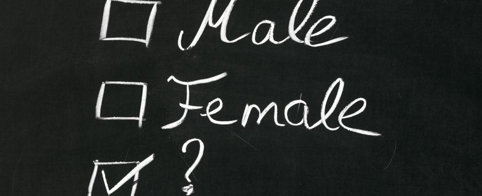 Chalkboard with checkboxes next to Male, Female, and ? The question mark is checked.