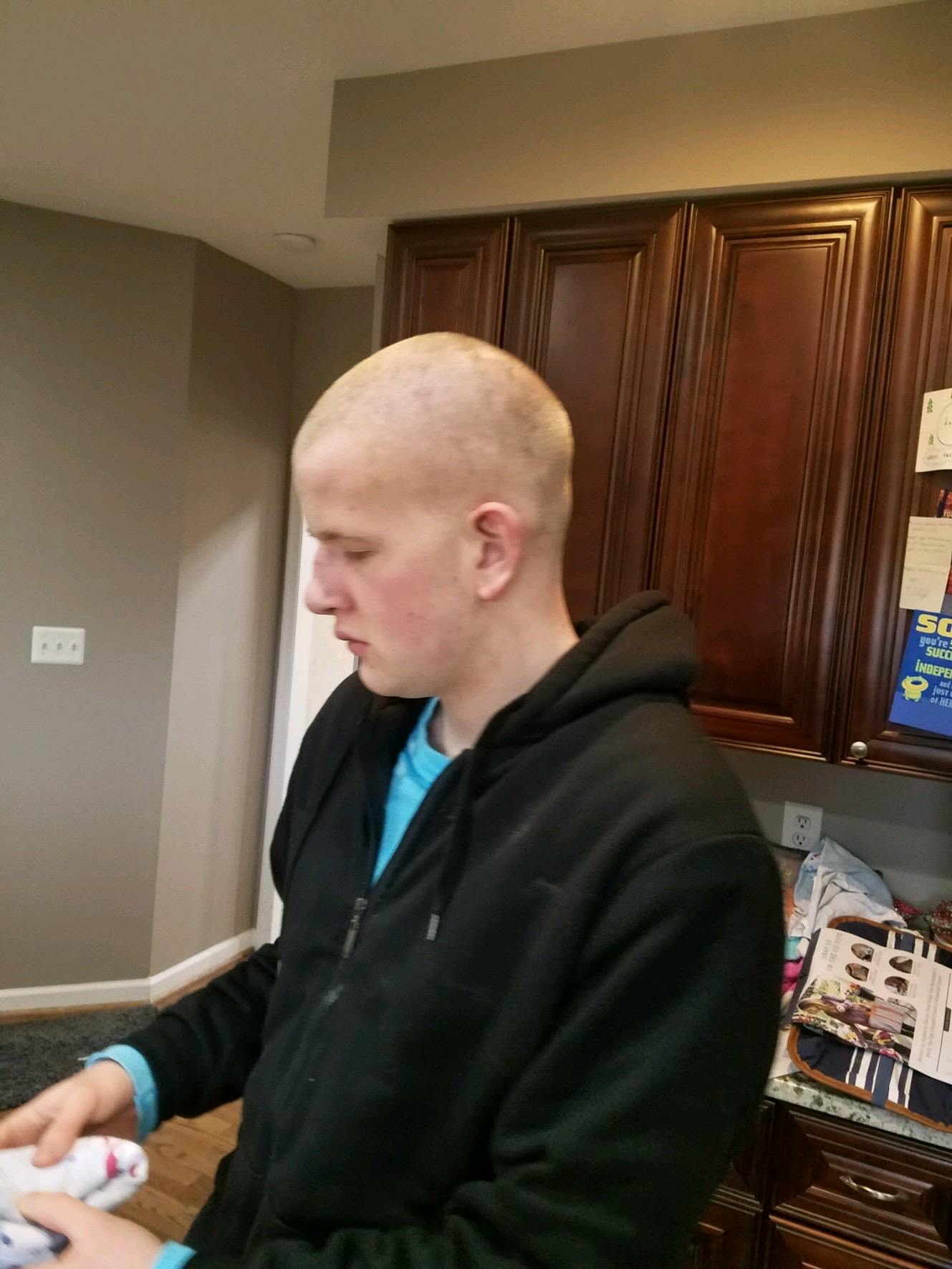 Image of Trevor with a shaved head, having made a recovery from his very. very. very. uneven recent cut.