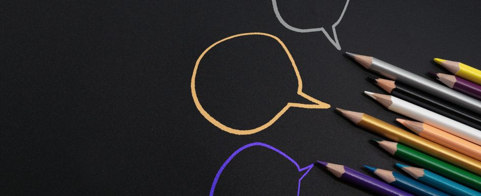 Image has colored pictures with talk bubbles against a black background to demonstrate the contrast between written and verbal communication for autistic people with autism