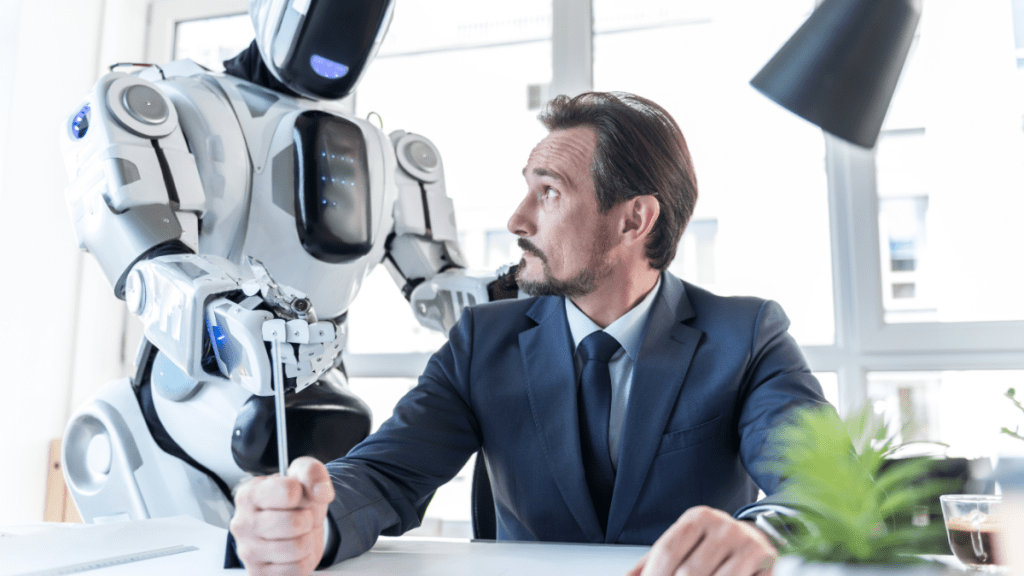White person in suit at work looking at robot touching them while holding a ruler.